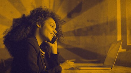 A young woman talking on a phone interview