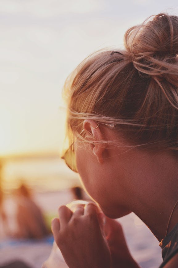 How To Clean Earrings Without Ruining Them, Because Dirty Jewelry Can