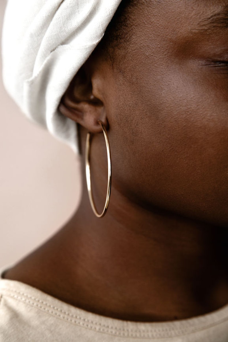 How To Clean Earrings Without Ruining Them, Because Dirty Jewelry