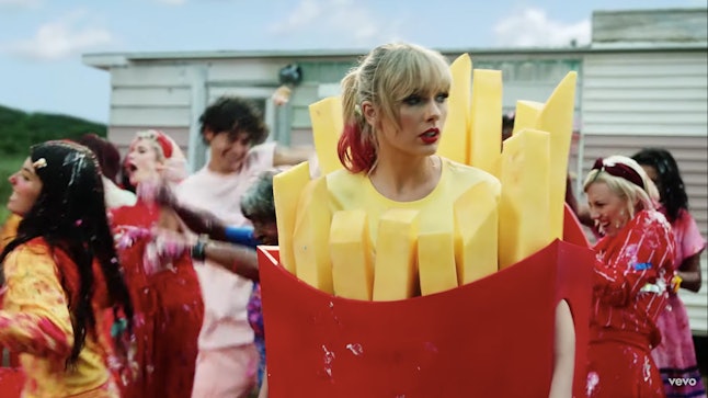 All The Looks From Taylor Swifts You Need To Calm Down Music Video Are A Rainbow Dream