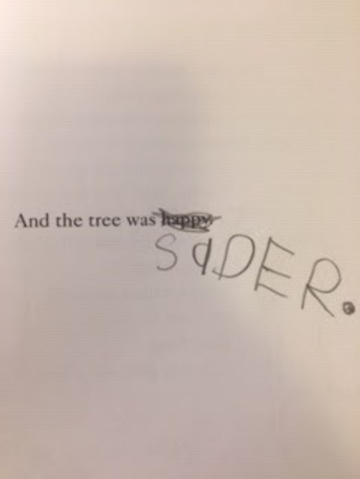 "And the tree was sader" written over "the tree was happy"