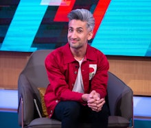 Tan France in a red jacket, white shirt, and black pans in the 'Queer Eye' show
