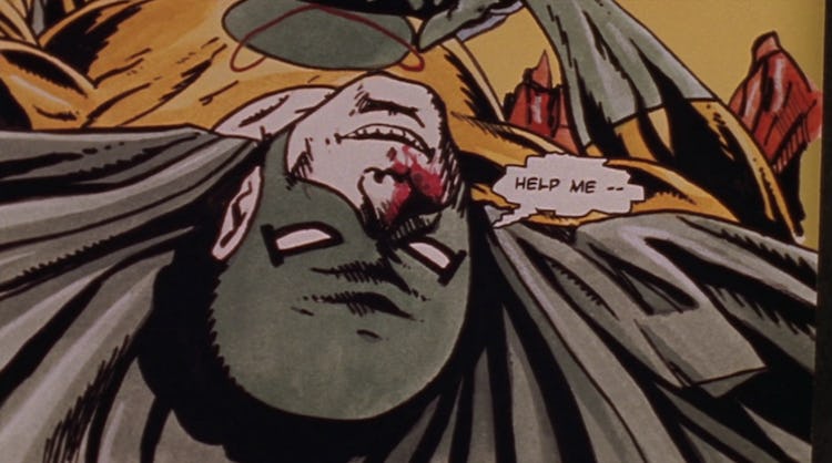 An upside down illustration of Damian Wayne saying "help me"