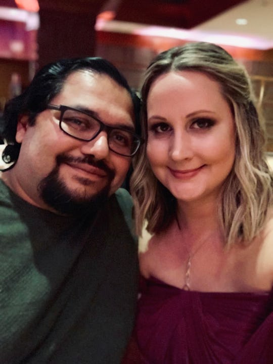 Kristen Cervantes smiling while taking a selfie with her husband