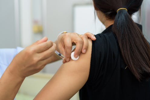A woman getting HPV vaccine