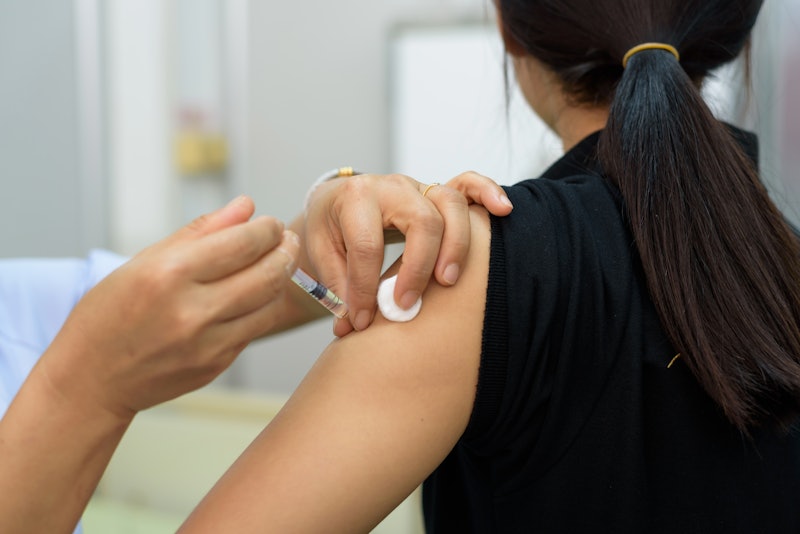 A woman getting HPV vaccine