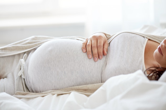 Experts know you're exhausted, but it's best to wait until your body goes into labor naturally.