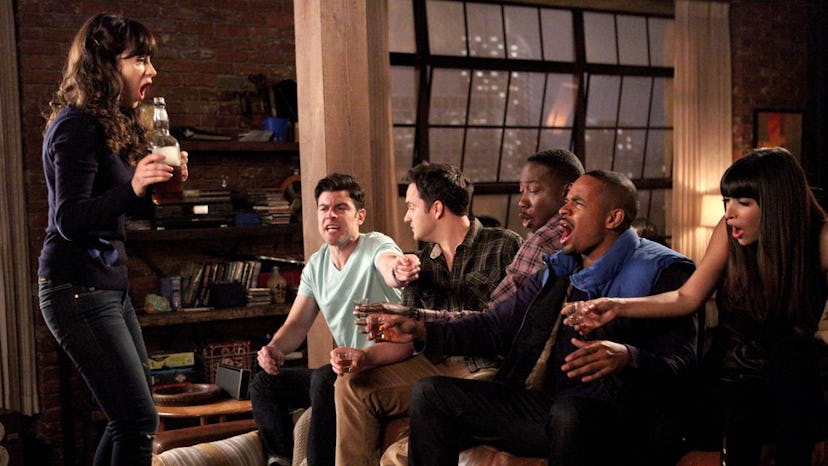 A scene from the 'New Girl' TV show where Jess and others play a wild game of True American