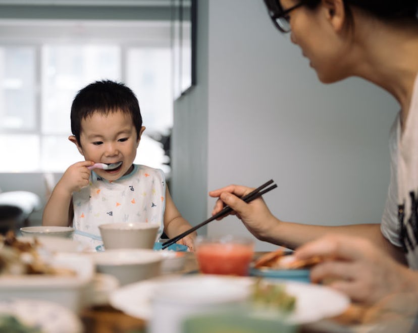 can toddlers eat shrimp ? Toddler eating at the table