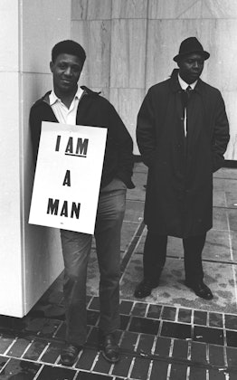 Portrait of two African American participants of the march in Memphis, TN, April 1968