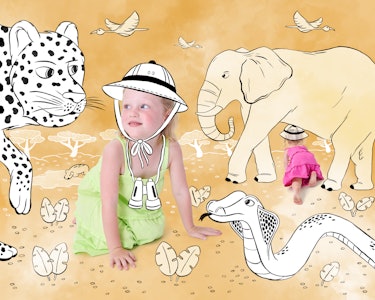 One of the Busby's daughter with a doodled safari hat on and doodles of jungle animals
