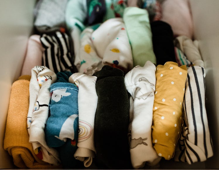 Molly Yeh's baby nursery with cloths folded in the KonMari style of folding cloths