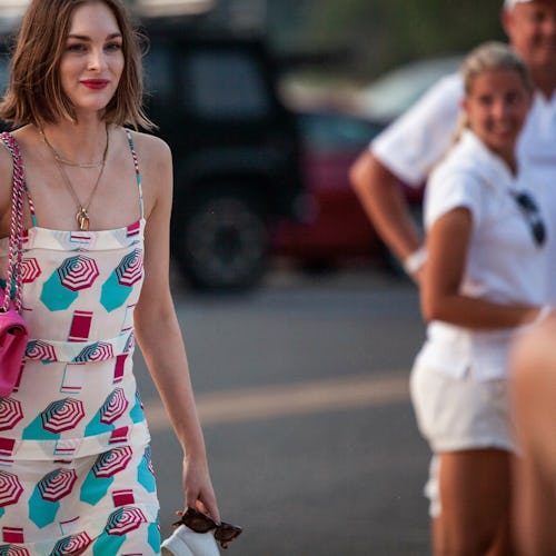 A girl wearing a colorful summer party outfit for Chanel's J12 Soiree