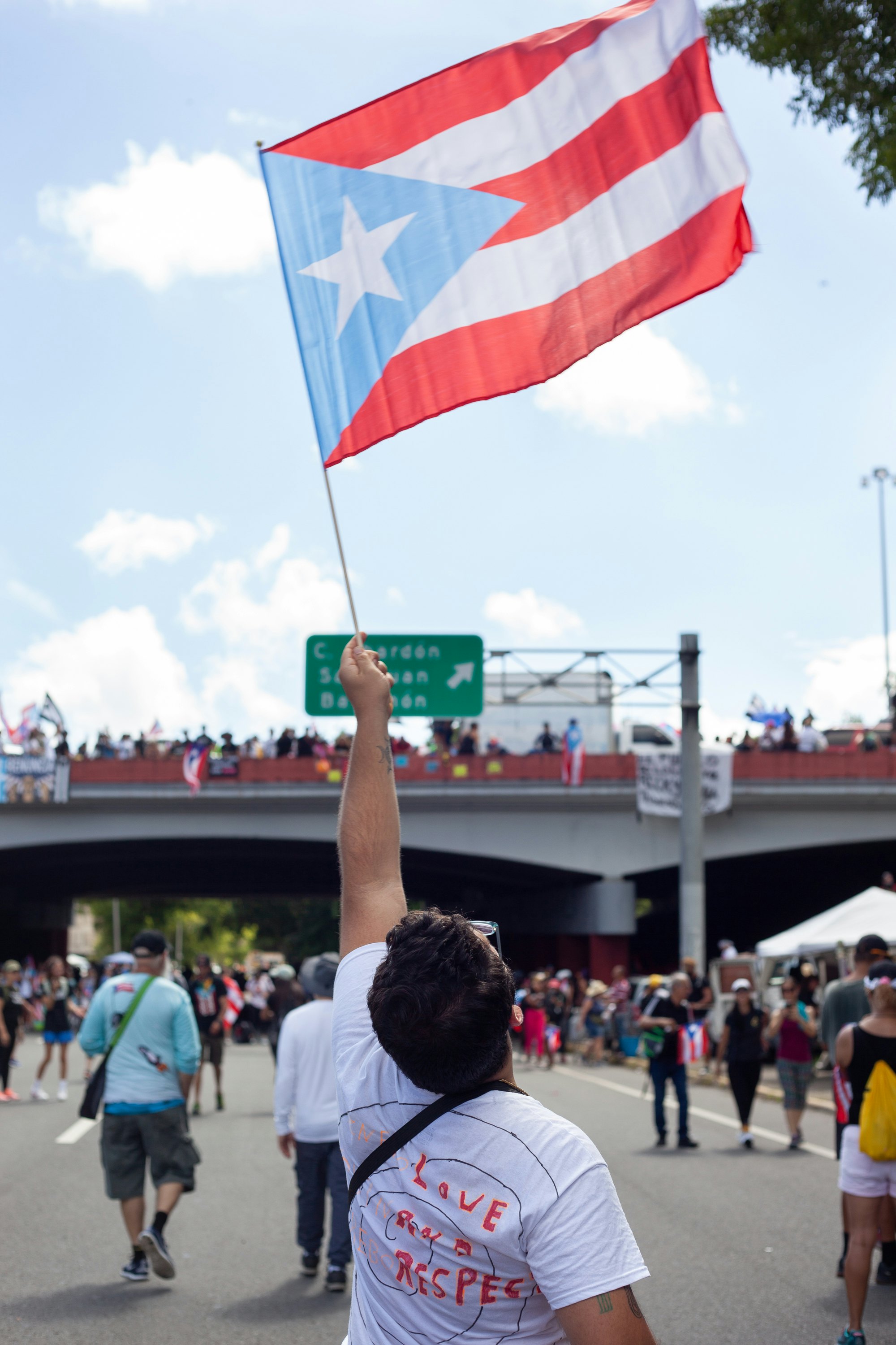 5 Protestors In San Juan Share Why They Wear The Puerto Rican Flag