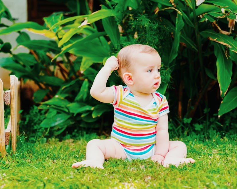 Your baby pulling on their hair is pretty common and is a self-soothing idea for them.