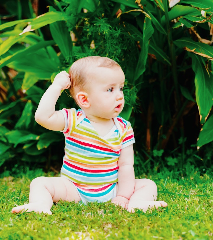 Your baby pulling on their hair is pretty common and is a self-soothing idea for them.