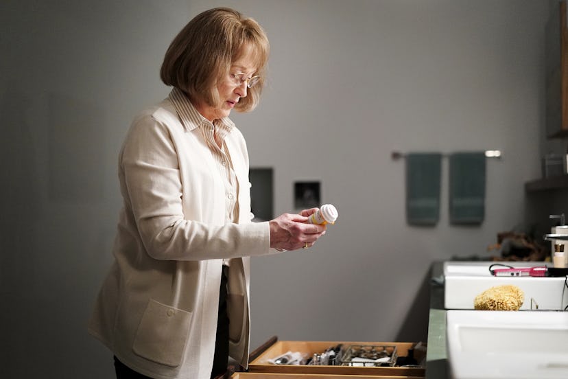 Mary Louise in Big Little Lies looking at a pill bottle 