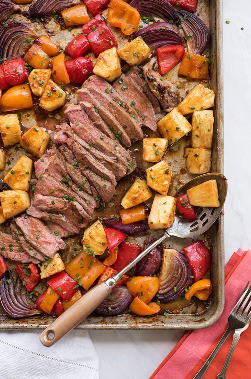 image of gluten-free sheet pan recipe featuring hawaiian steak, pineapple and peppers