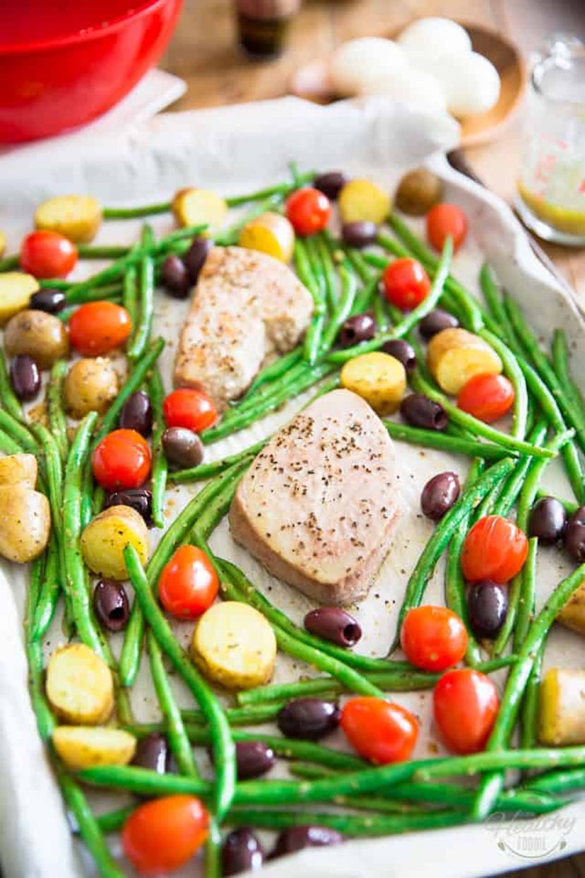 image of gluten-free sheet pan recipe for salad nicoise with salmon, green beans, potatoes and olive...