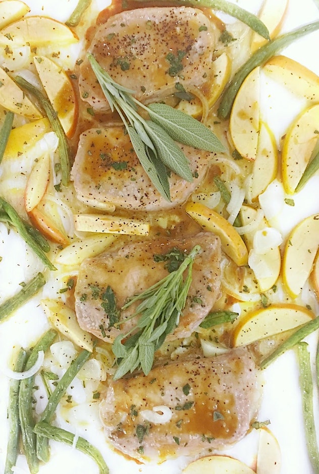 image of gluten-free sheet pan recipe, close up of pork chops, sliced apples, thyme