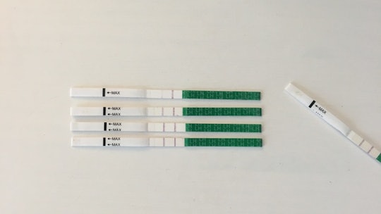 Five positive ovulation test strips