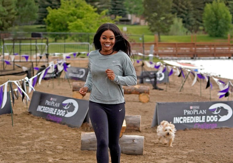 Gabby Douglas’ Dogs Help Her Stay Active(00)