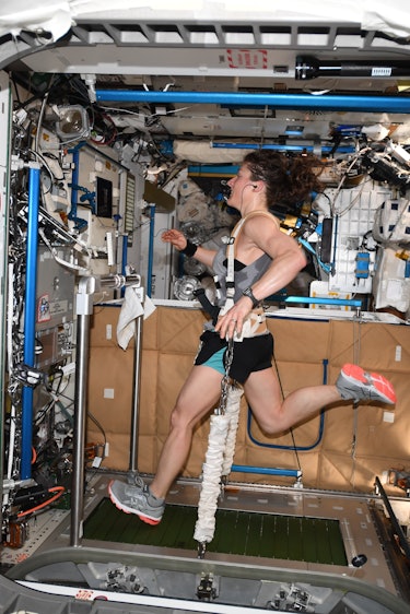 Koch running on the International Space Station treadmill 