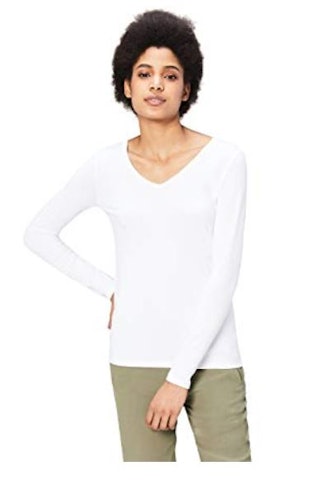 This long sleeve white t-shirt features a fabric blend that makes it soft and thick, so you won't ne...
