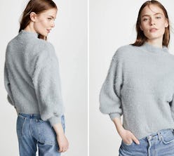 A woman in a grey sweater that is available on Amazon