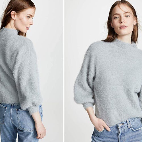 A woman in a grey sweater that is available on Amazon