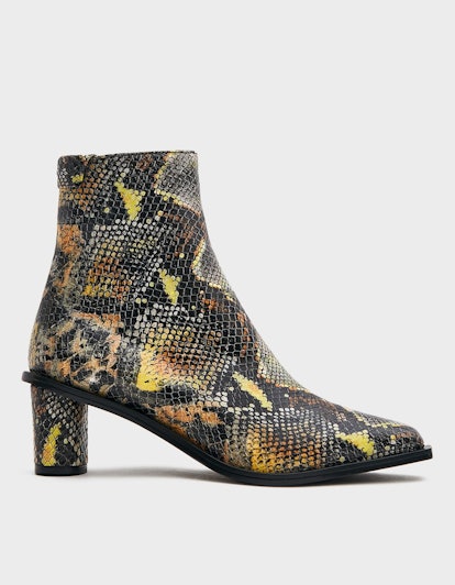 Tracee Ellis Ross' Snakeskin Boots Are A Chic Nod To The Season Ahead