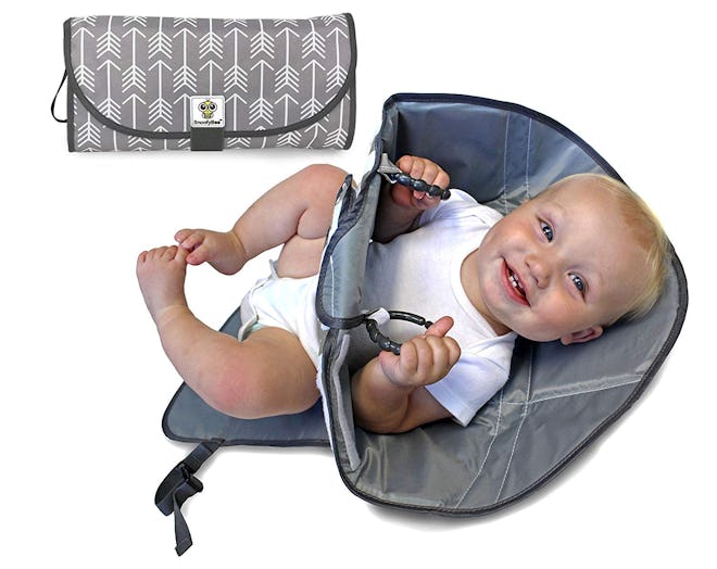 3-In-1 Changing Pad, Diaper Clutch, and Redirection Barrier