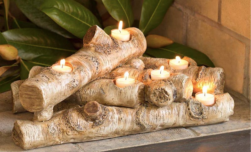 This Fireplace Candle Holder Will Keep Your Apartment Very Cozy