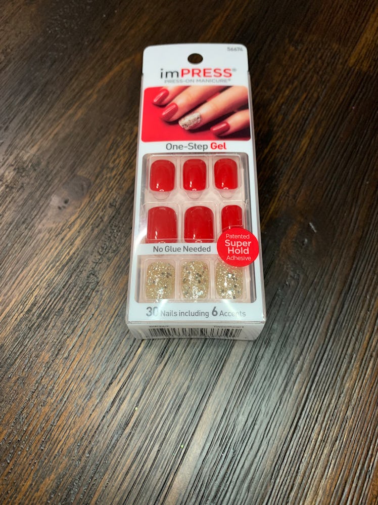A pack of red and shimmery silver imPRESS press-on nails