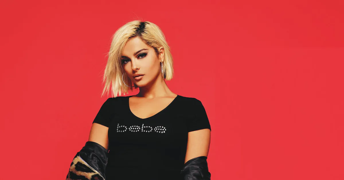 Bebe Rexha S 19 Bebe Fall Campaign Features The Iconic Crystal Logo Baby Tee Bebe Rexha S 19 Bebe Fall Campaign Features The Iconic Crystal Logo Baby Tee