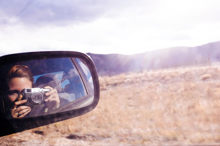 Young woman taking an Instagram picture in Colorado, in need of caption.