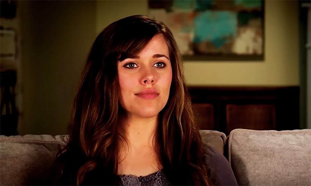 A close-up portrait of Jessa Duggar with a neutral facial expression