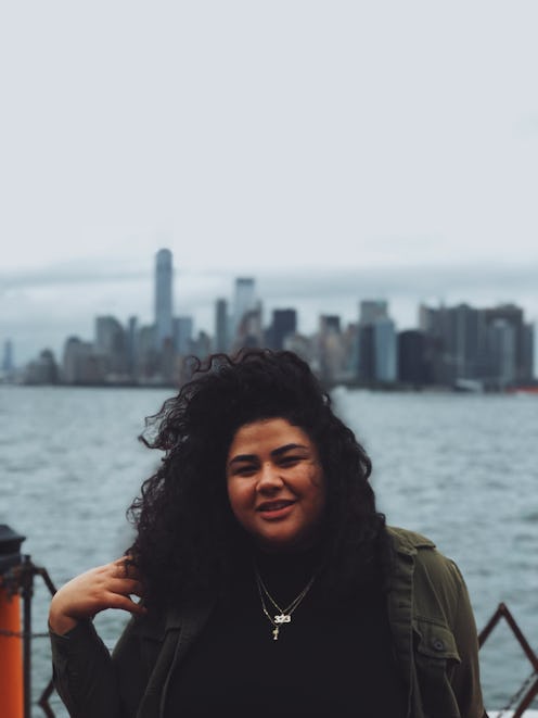 Author Estefani Alarcon with the New York City in her background
