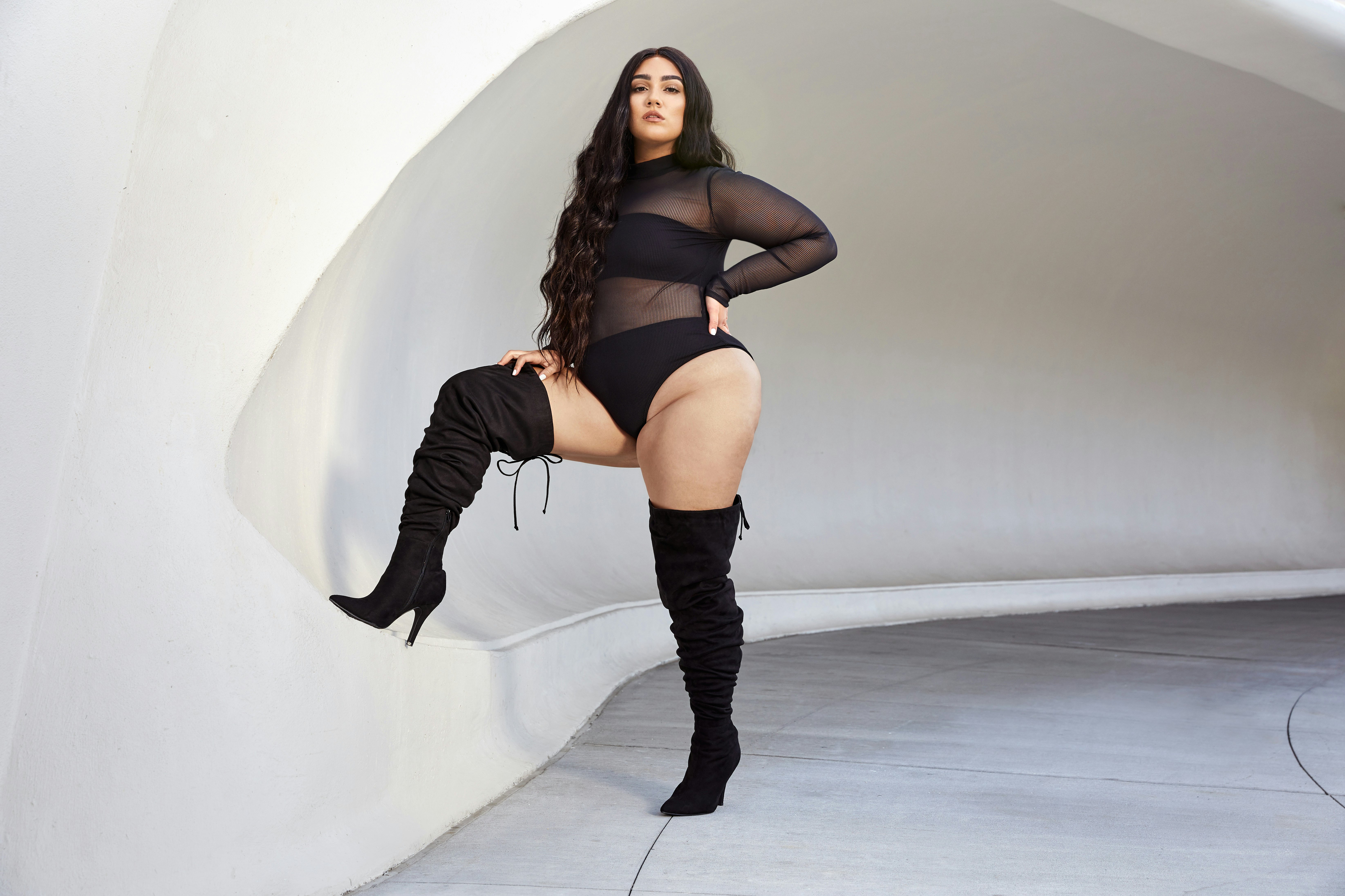 Nadia Aboulhosn's Fashion To Figure Collab Features Thigh-High, Plus-Size  Boots