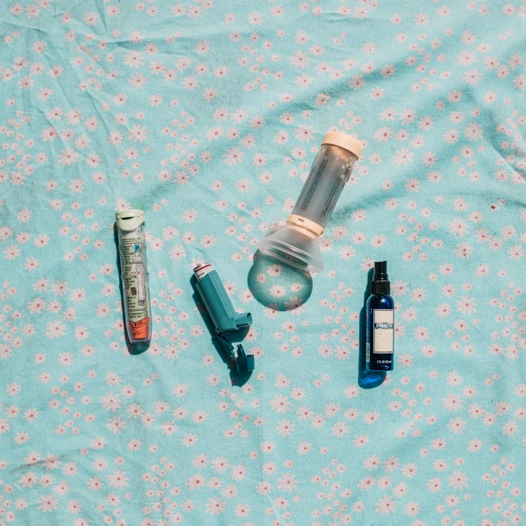 A hand sanitizer, an inhaler and an EpiPen from Caprice's bag