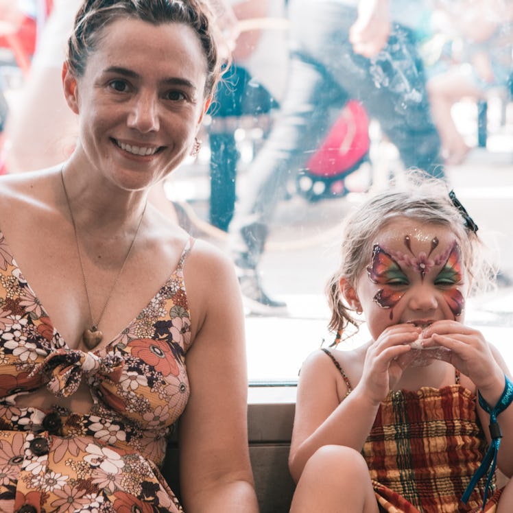 Sabrina and her three-year-old daughter who has her face painted
