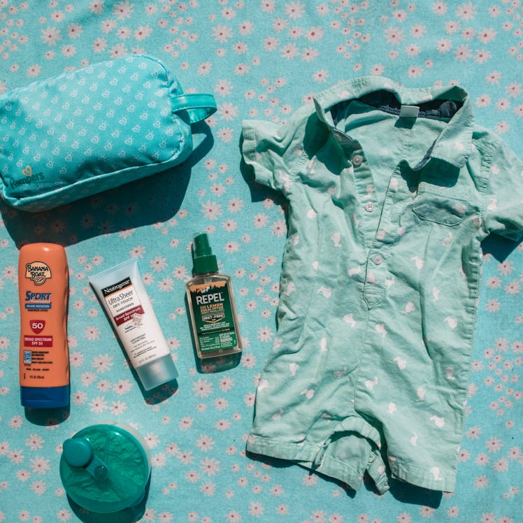 Diapers, wipes and an extra set of clothes for the baby from a mom's bag