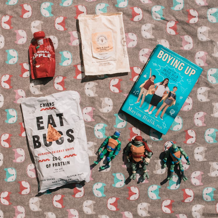 Books, toys and snacks from a mom's bag