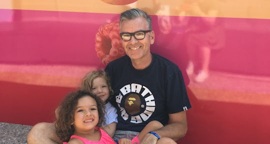 A dad and his two daughter at Camp Romper