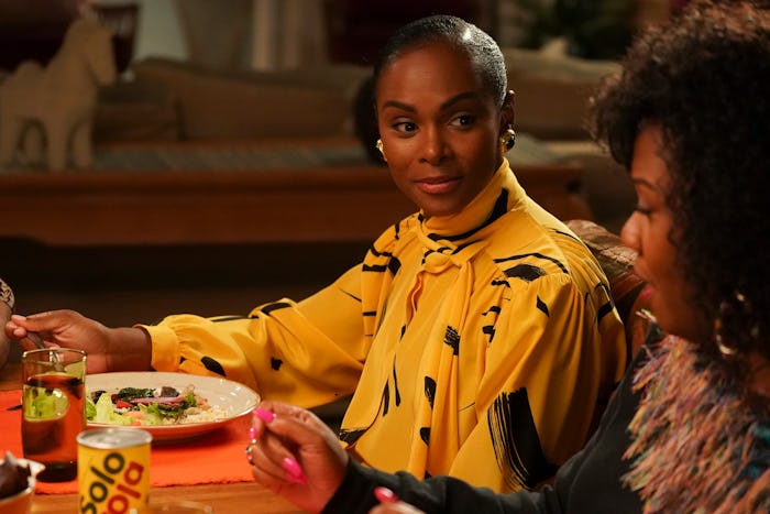 Tika Sumpter in a yellow dress dining as Alicia in 'Mixed-Ish'