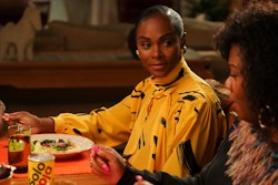 Tika Sumpter in a yellow dress dining as Alicia in 'Mixed-Ish'