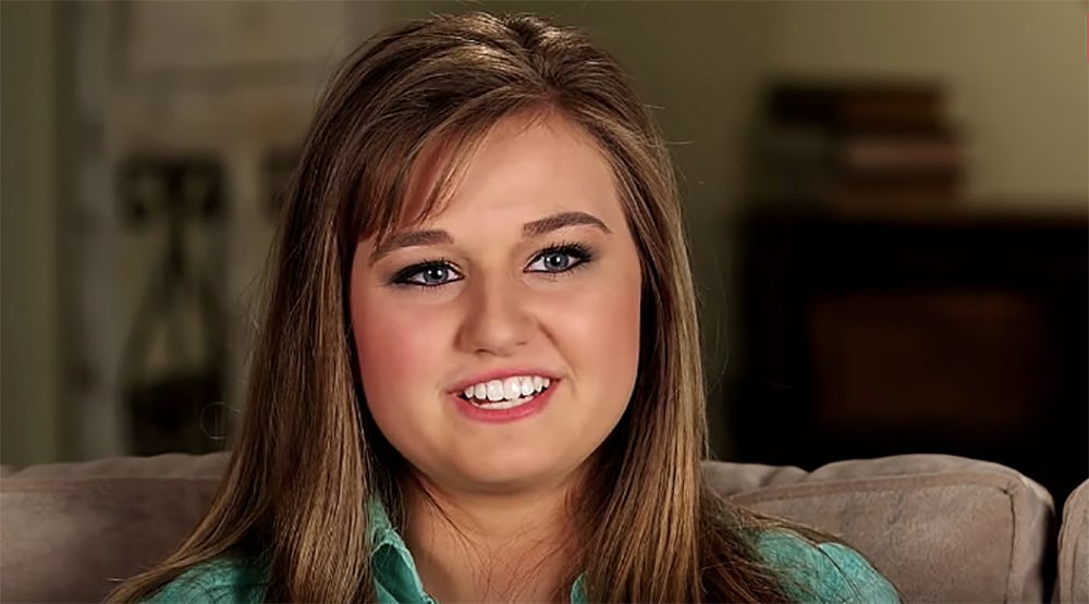 Kendra Duggar after giving birth to baby No. 2, smiling for a photo