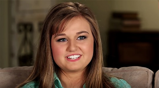 Kendra Duggar after giving birth to baby No. 2, smiling for a photo