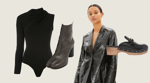 A model in a black mylar blazer surrounded by an asymmetrical bodysuit, calfskin tabi boots, and lea...