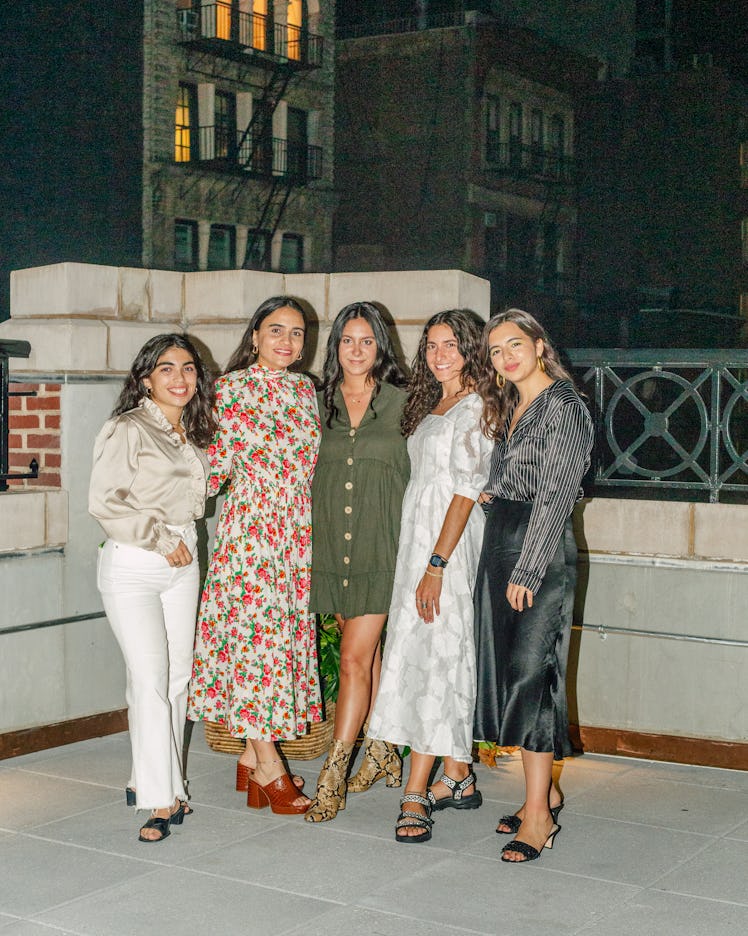 Emperifollá Editorial Director Frances Solá Santiago with a group of young women posing for a pictur...